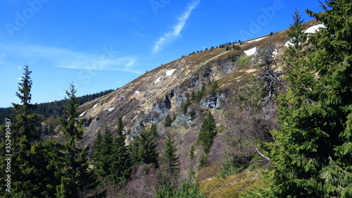 View of Velky Kotel valley in summer Jeseniky mountains, Czech Republic. Hillside with prominent rock formations.