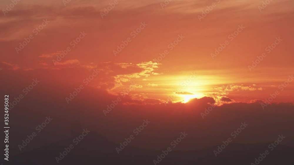 Timelapse of the Sun Going Down Though the Clouds Timelapse of the Sun Going Down Though the Clouds