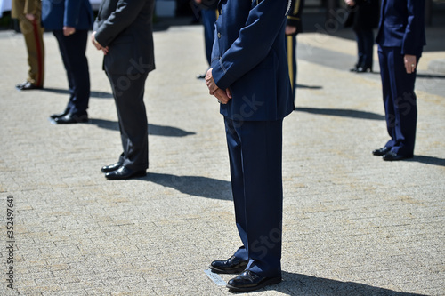 Military personnel in formation during ceremony maintaining social distance as a protection measure during corona virus pandemic