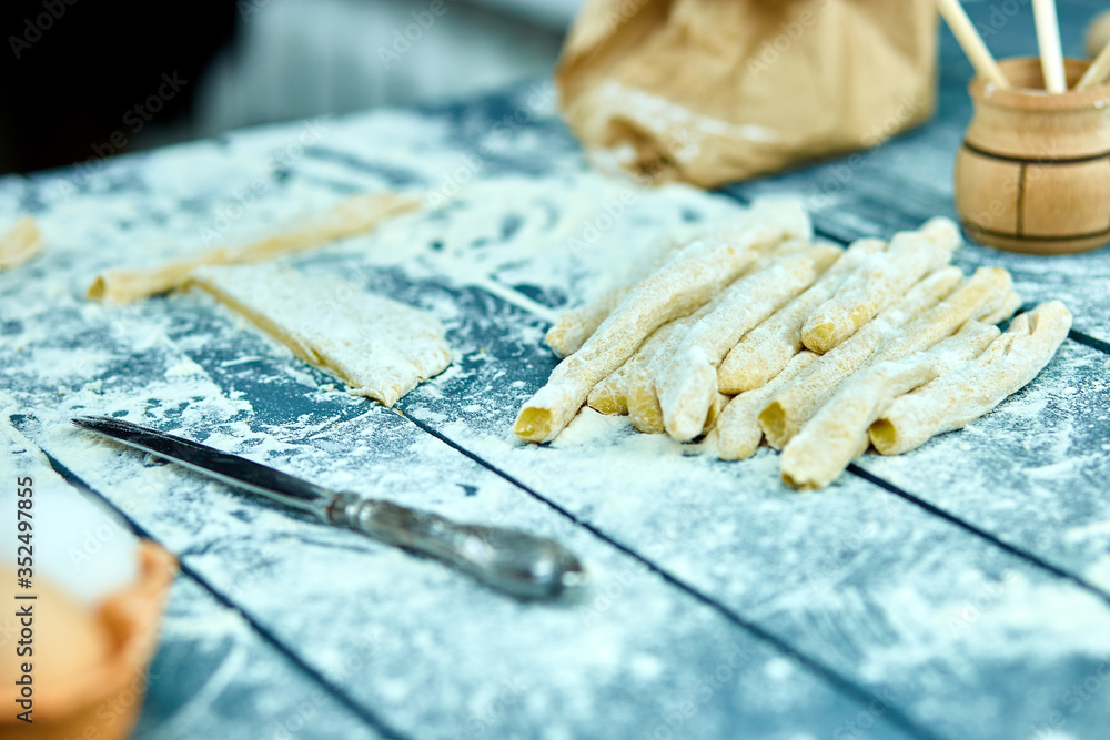Naklejka premium Closeup process making homemade pasta. Fresh dough