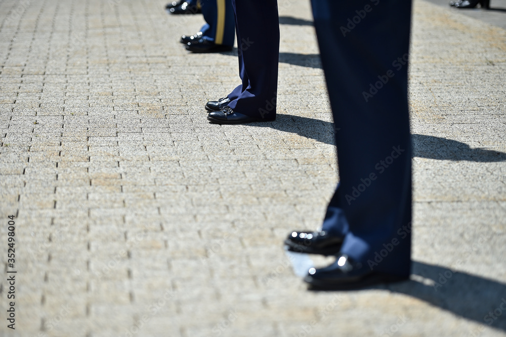 Military personnel in formation during ceremony maintaining social distance as a protection measure during corona virus pandemic Military personnel in formation during ceremony maintaining social distance as a protection measure during corona virus pandemic