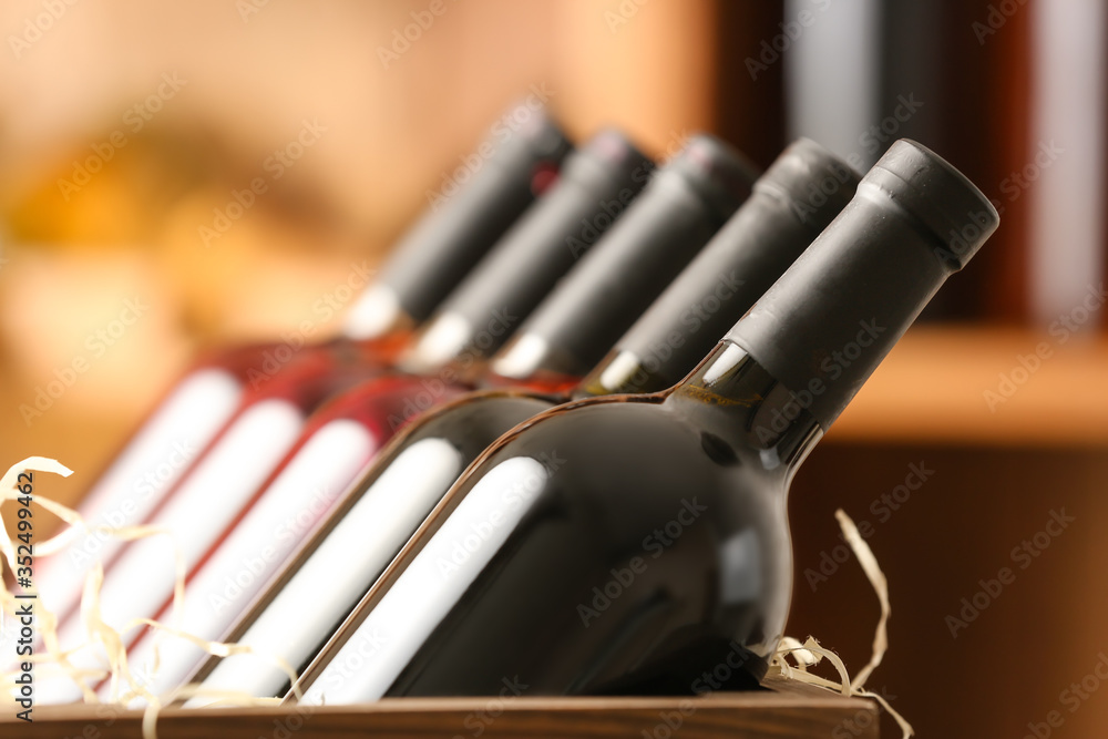 Box with bottles of wine in cellar, closeup Box with bottles of wine in cellar, closeup