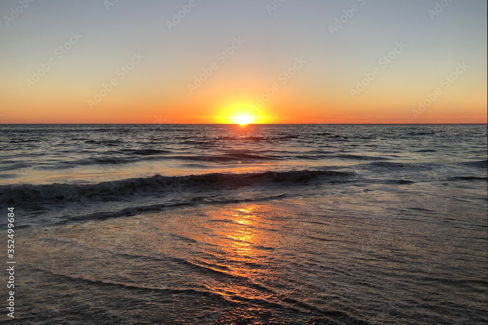 Red beautiful sunset over sea or ocean Red beautiful sunset over sea or ocean