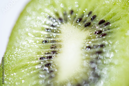 close up of ripe and fresh kiwifruit half