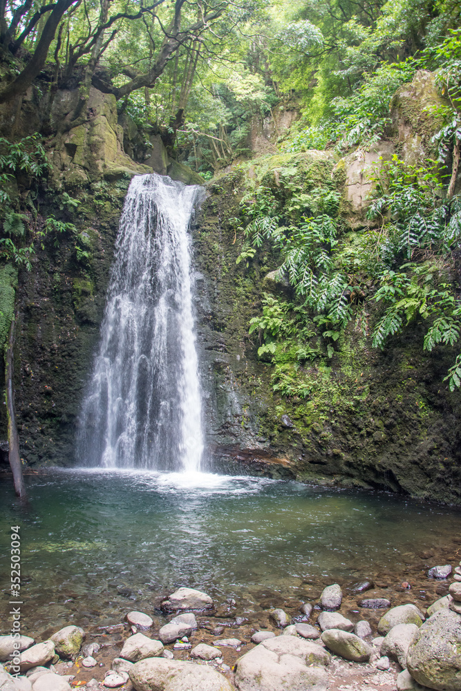 Naklejka premium walk and discover the prego salto waterfall on the island of sao miguel, azores