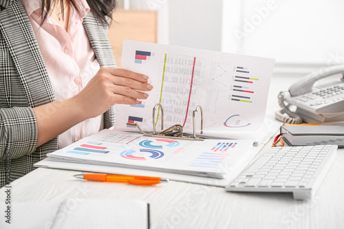 Female accountant working i...