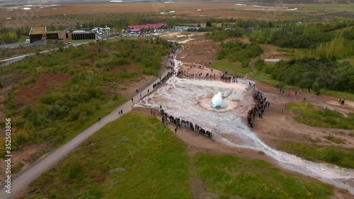 aerial sot of a  big active geyser in Iceland  explotion 