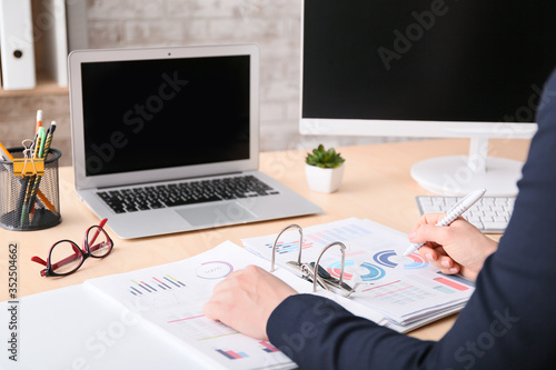 Female accountant working i...