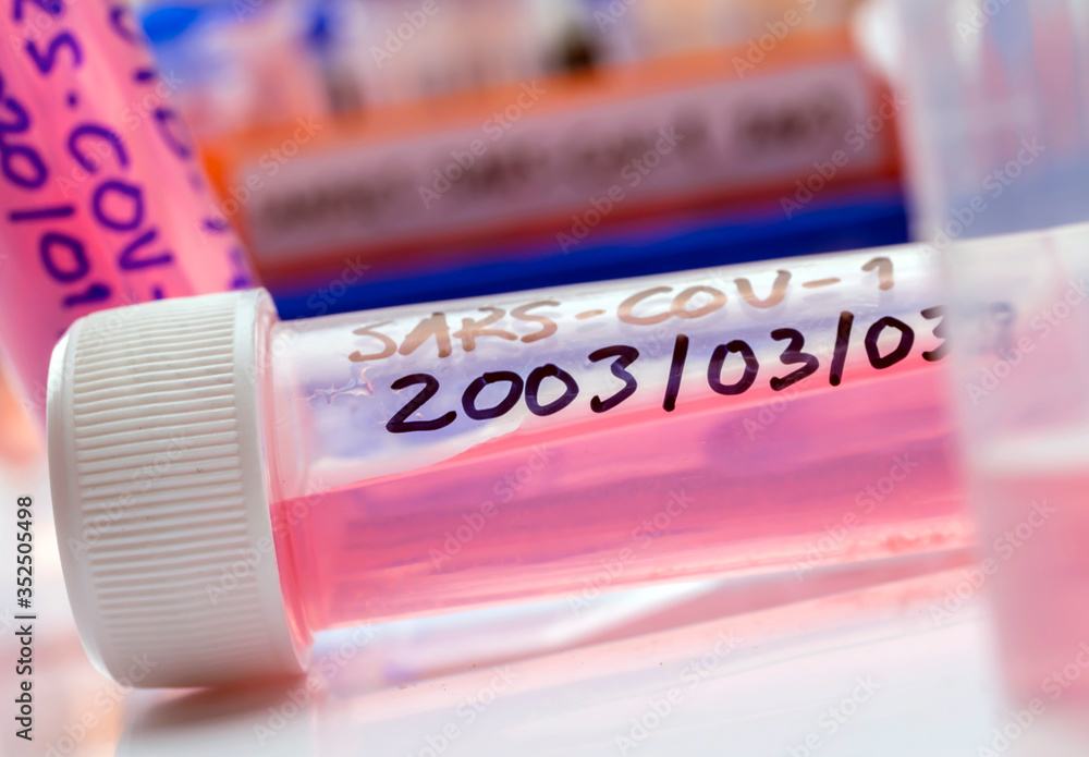 Vials with samples of SARS-COV-1 in a research laboratory, conceptual image