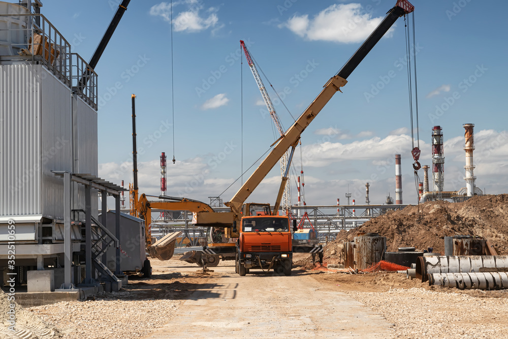 Construction site of an oil refinery with a large number of construction equipment