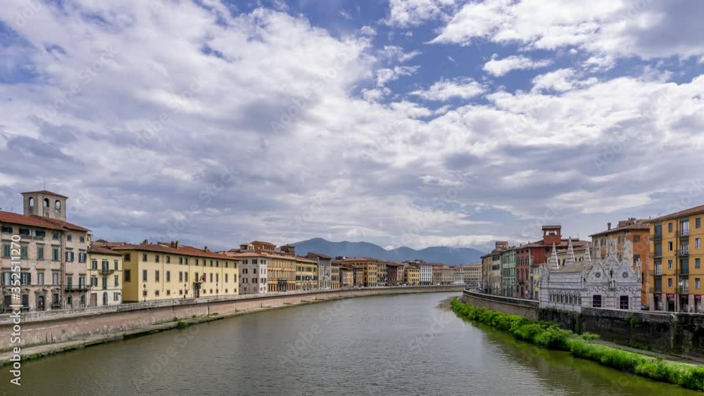 Beautiful view of the Lungarni of Pisa, Italy, of the historic center with the Church of Santa Maria della Spina from the Solferino bridge. Time lapse motion Beautiful view of the Lungarni of Pisa, Italy, of the historic center with the Church of Santa Maria della Spina from the Solferino bridge. Time lapse motion