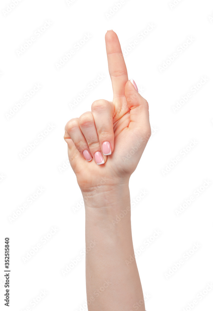 Female hand showing one finger up on white Female hand showing one finger up on white