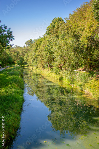 Water canal in public park Charruyer, La Rochelle, France