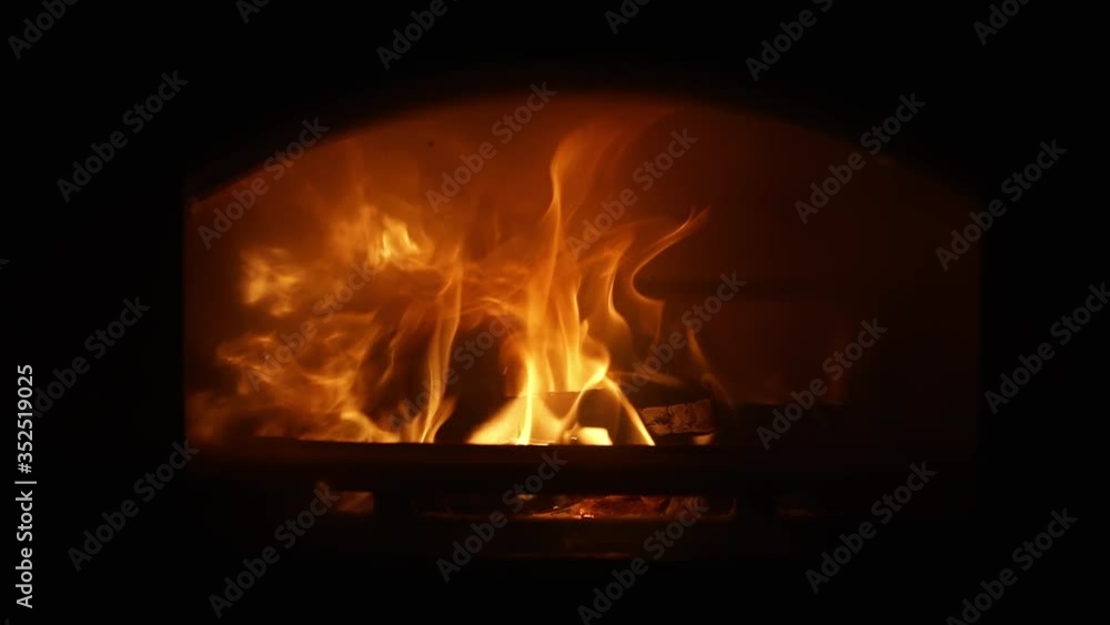 Fire burning inside the fireplace (slow motion 120fps) Fire burning inside the fireplace (slow motion 120fps)