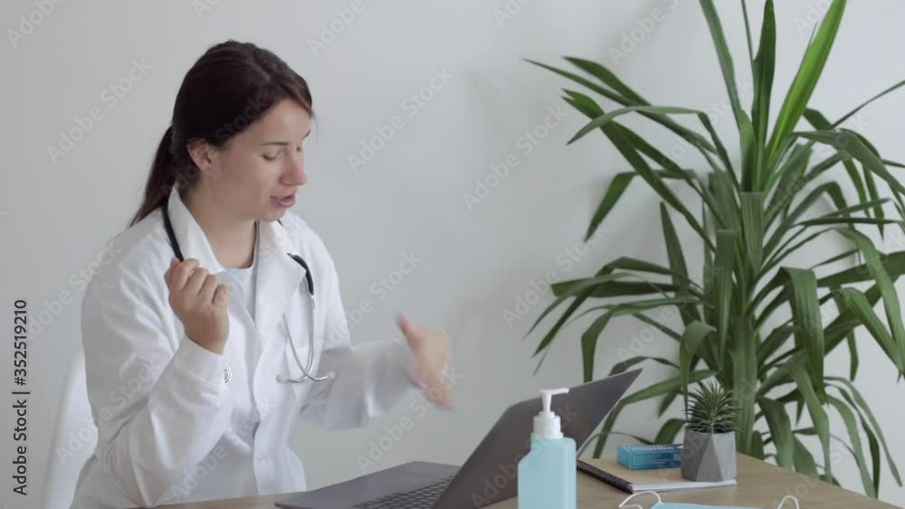 Business woman using laptop computer at desk. Online education or remote work concept Business woman using laptop computer at desk. Online education or remote work concept