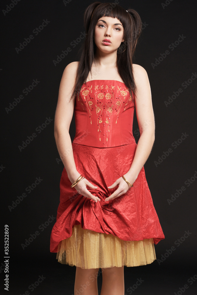 Portrait of beautiful young woman posing. doll