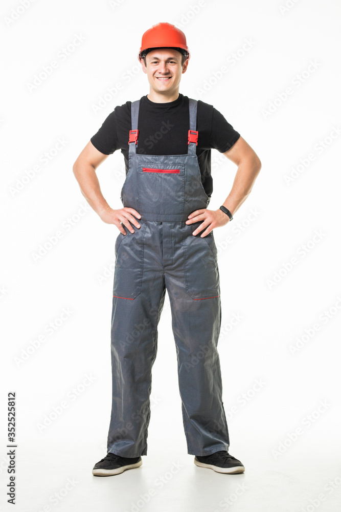 Portrait of smiling manual worker with tools isolated on white background Portrait of smiling manual worker with tools isolated on white background