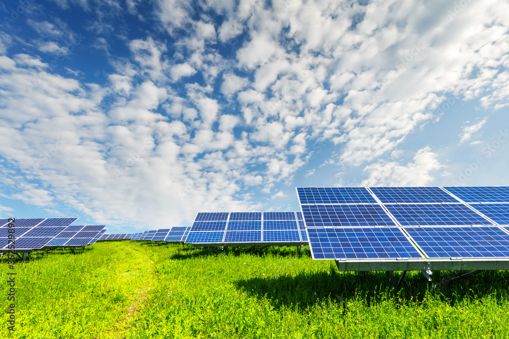 Foto Solar panel on blue sky background