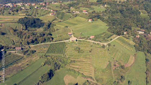 Spectacular aerial view of countryside with many fields and vineyards.