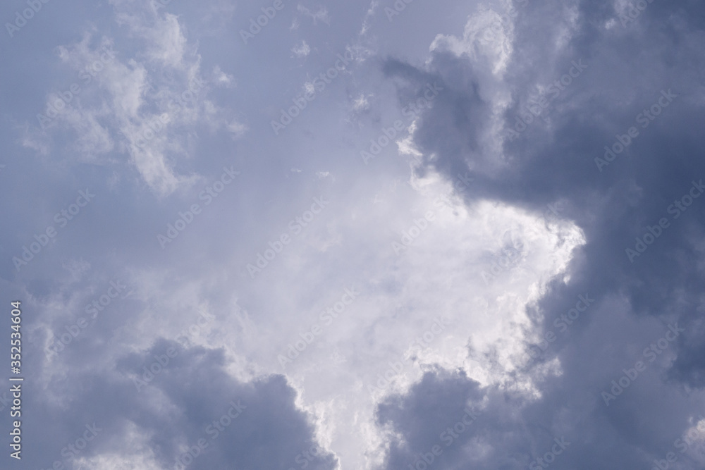 Obraz premium Aerial view of gray cloudy against sky background.