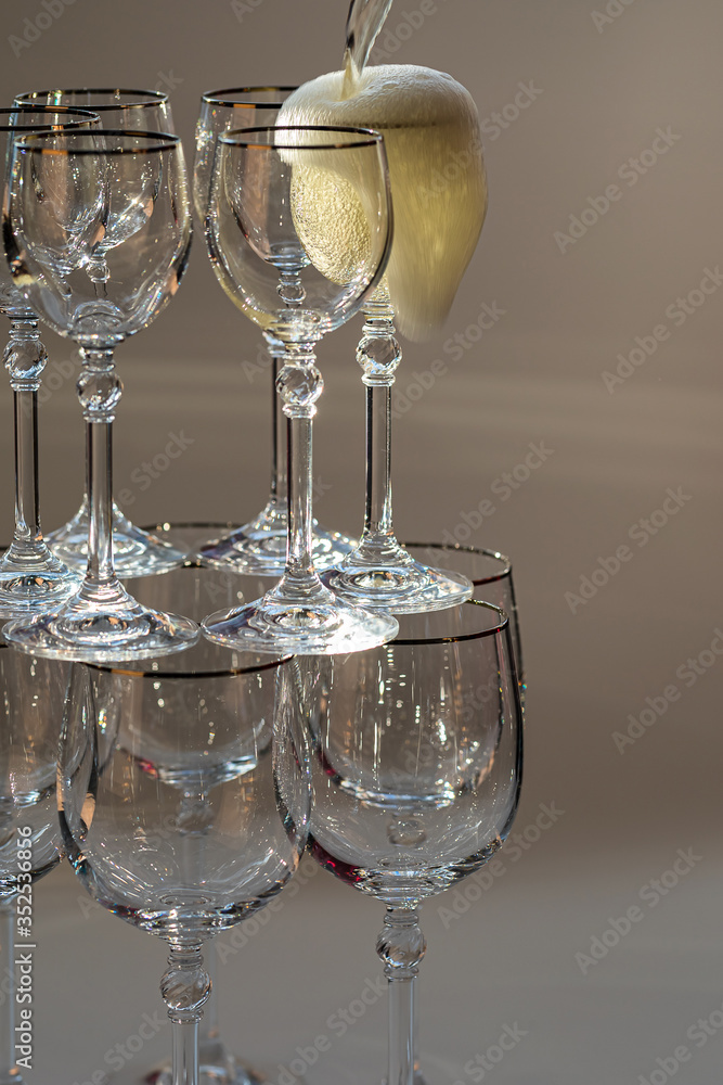 Beautiful glass with champagne and ice of different colors. Beautiful glass with champagne and ice of different colors.