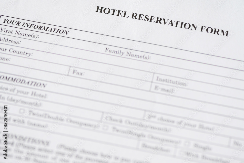 Hotel reservation form. Hotel service. Reception desk, registration. Close up. Selective focus. Hotel reservation form. Hotel service. Reception desk, registration. Close up. Selective focus.