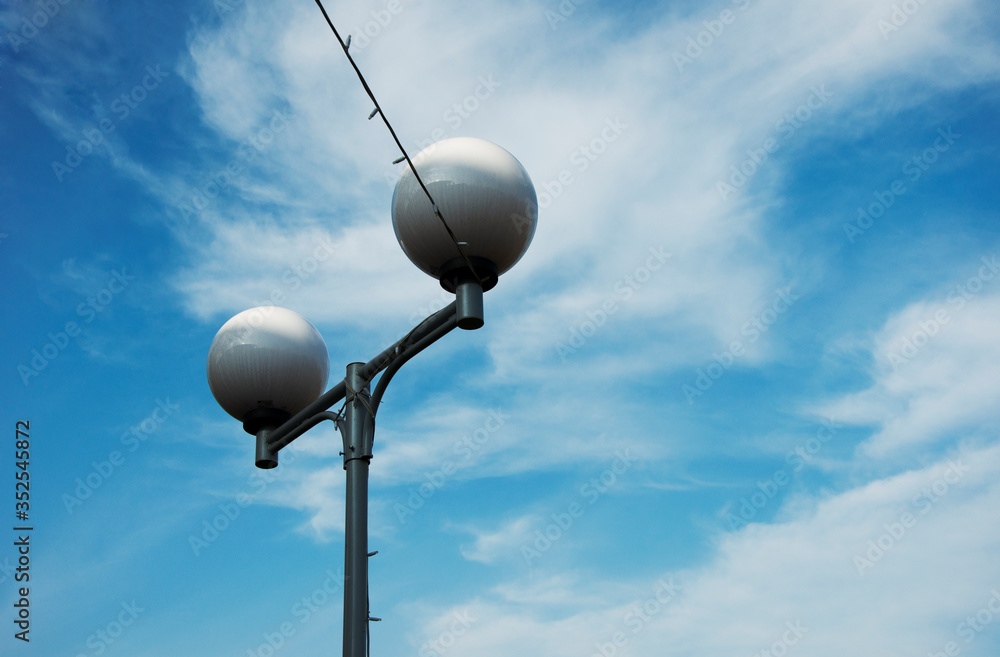 Street lamp on blue sky background Street lamp on blue sky background