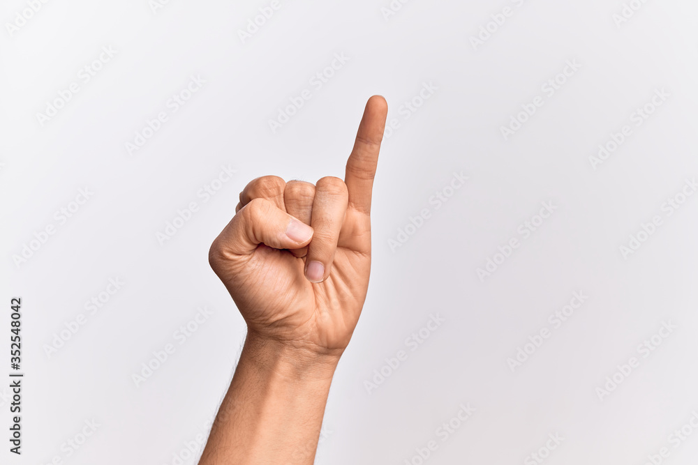 Hand of caucasian young man showing fingers over isolated white background showing little finger as pinky promise commitment, number one Hand of caucasian young man showing fingers over isolated white background showing little finger as pinky promise commitment, number one