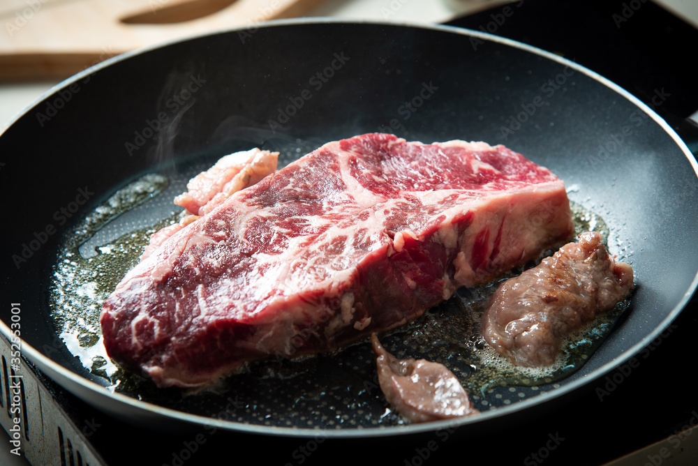 Wagyu Japanese beef steak frying on the pan Wagyu Japanese beef steak frying on the pan