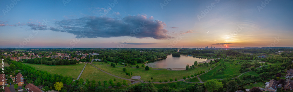 Panoramic sunset drone landscapes of Lanstropsee lake in Dortmund Panoramic sunset drone landscapes of Lanstropsee lake in Dortmund