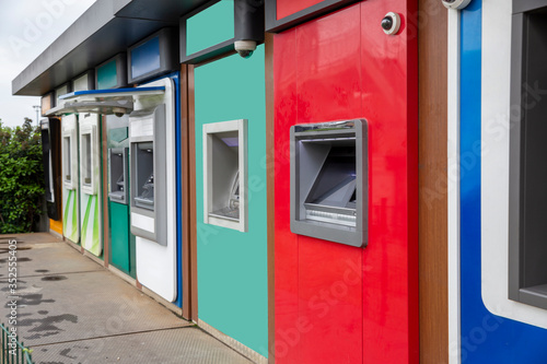 automated teller machine on the wall.