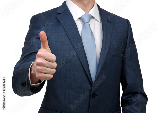 Businessman hand in suit showing thumb up symbol isolated on white