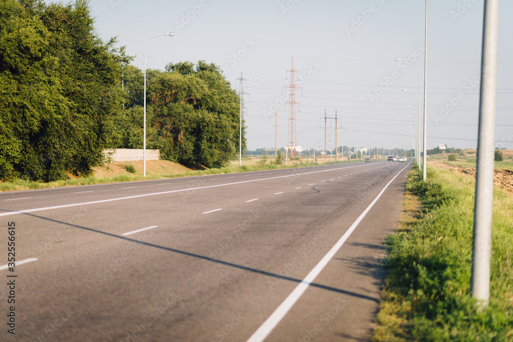 Asphalt highway near Dnipro sity in the summer. Road perspective Asphalt highway near Dnipro sity in the summer. Road perspective