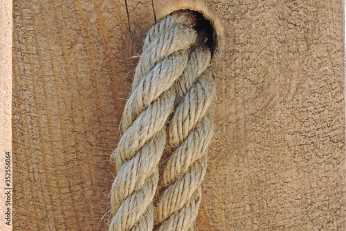 Canvas Print thick durable braided rope rough ragged surface of the board