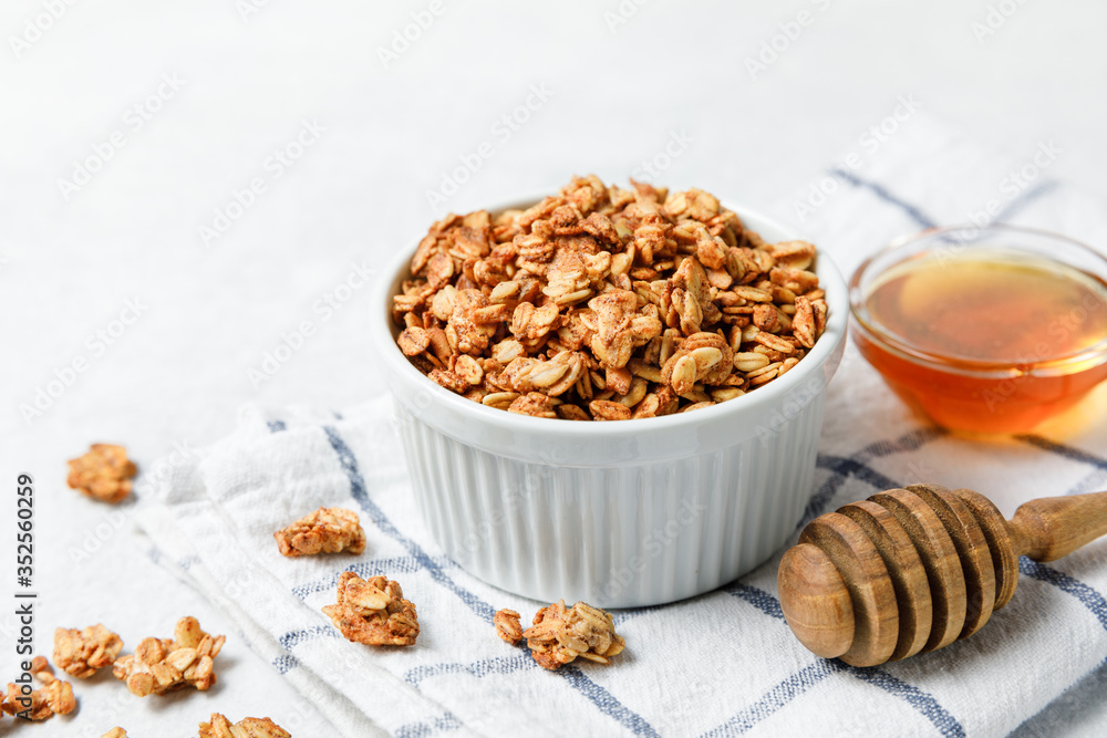 Homemade oatmeal granola bowl on white background. Homemade oatmeal granola bowl on white background.