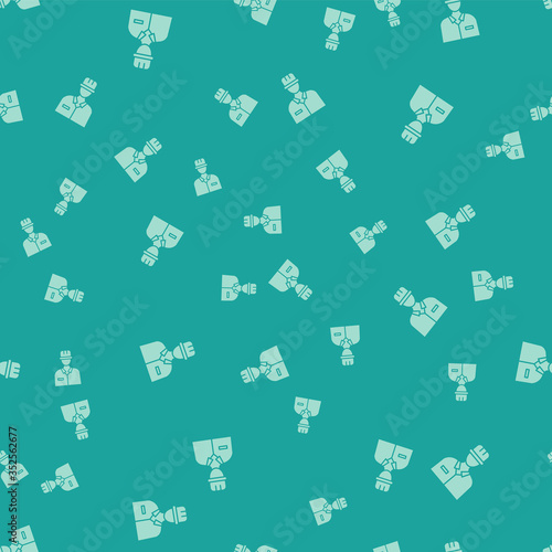 Green Oilman icon isolated seamless pattern on green background. Vector Illustration.