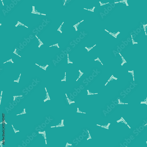 Green Pistol or gun with silencer icon isolated seamless pattern on green background. Vector Illustration.