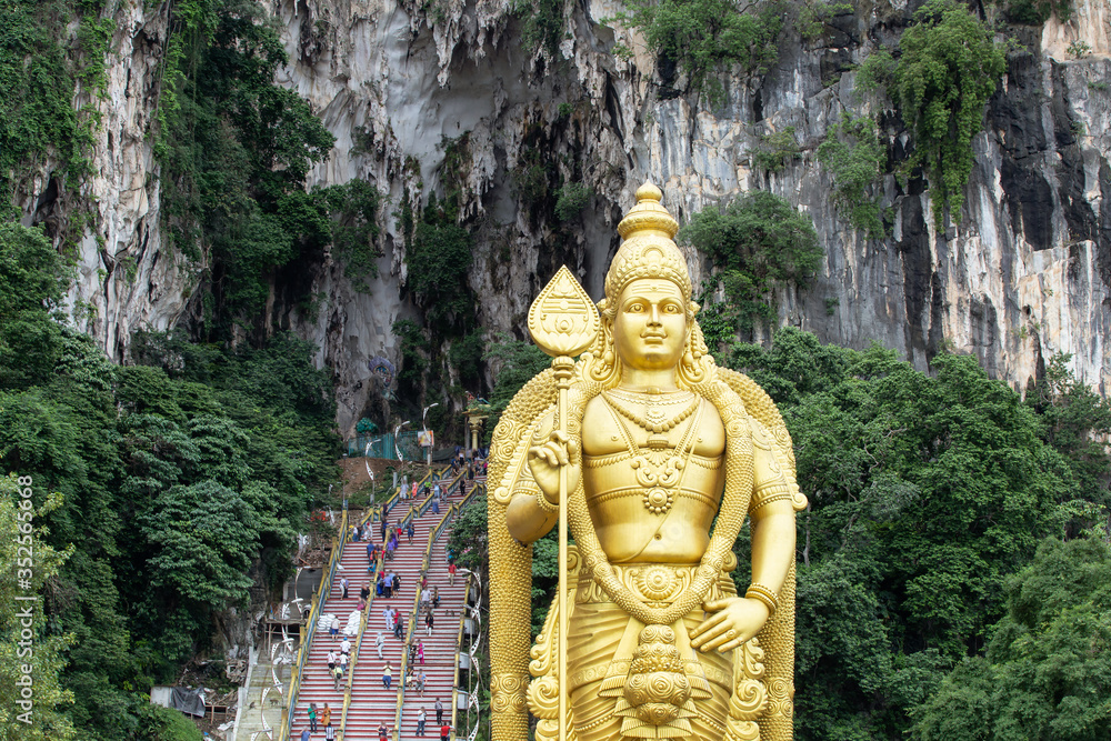 Batu Caves statue and entrance near Kuala Lumpur