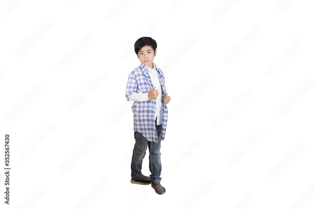 A portrait of a cute Asian elementary school student wearing jeans and a plaid shirt. An isolated image with white background A portrait of a cute Asian elementary school student wearing jeans and a plaid shirt. An isolated image with white background