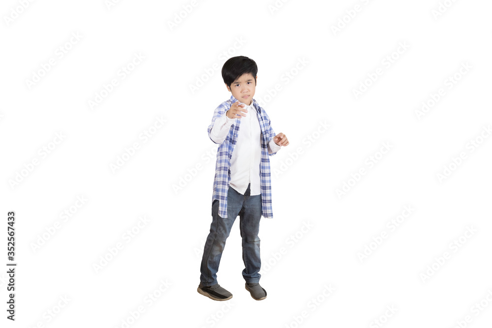 A portrait of a cute Asian elementary school student wearing jeans and a plaid shirt. An isolated image with white background A portrait of a cute Asian elementary school student wearing jeans and a plaid shirt. An isolated image with white background