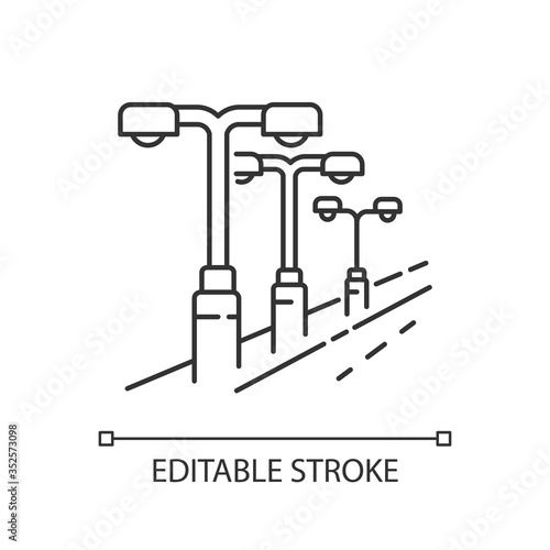 Street lighting pixel perfect linear icon. Lamp pillar row in public area. Downtown night lantern. Thin line customizable illustration. Contour symbol. Vector isolated outline drawing. Editable stroke