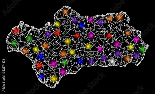 Web mesh vector map of Andalusia Province with glare effect on a black background. Abstract lines, light spots and circle dots form map of Andalusia Province constellation.