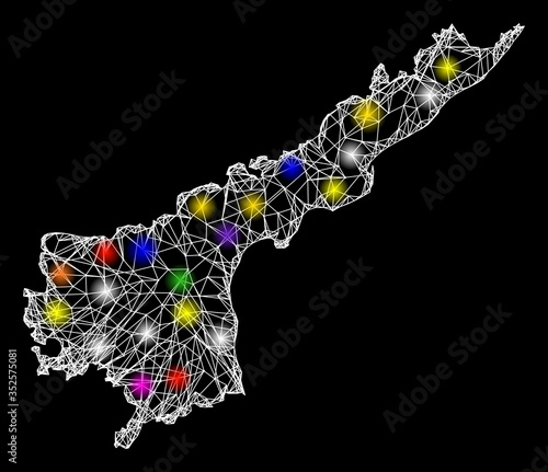 Web mesh vector map of Andhra Pradesh State with glare effect on a black background. Abstract lines, light spots and circle dots form map of Andhra Pradesh State constellation. photo