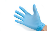 one hand in a blue glove with open fingers and palm up on a white background