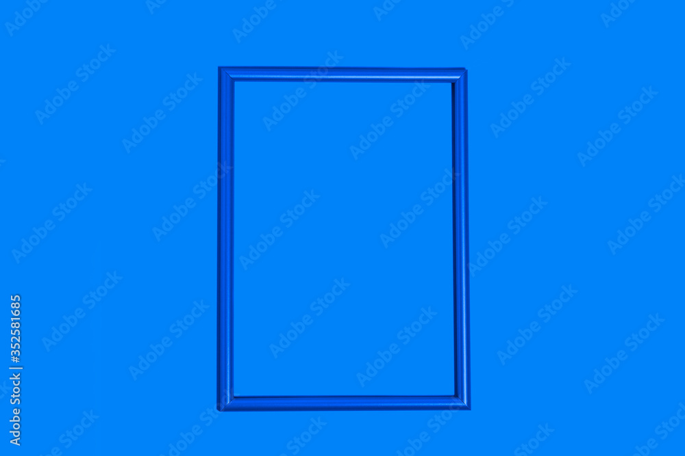 Empty mother-of-pearl frame in the center on a blue background with copy space Empty mother-of-pearl frame in the center on a blue background with copy space