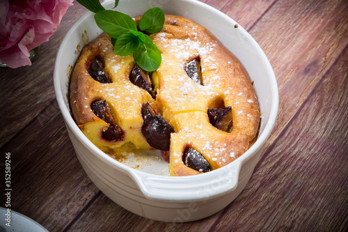 sweet homemade casserole with fruits inside in a plate