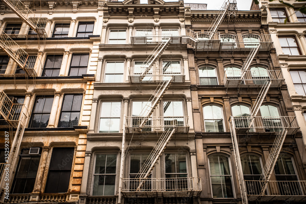 View of row of classic New York City apartment buildings in SoHo Manhattan