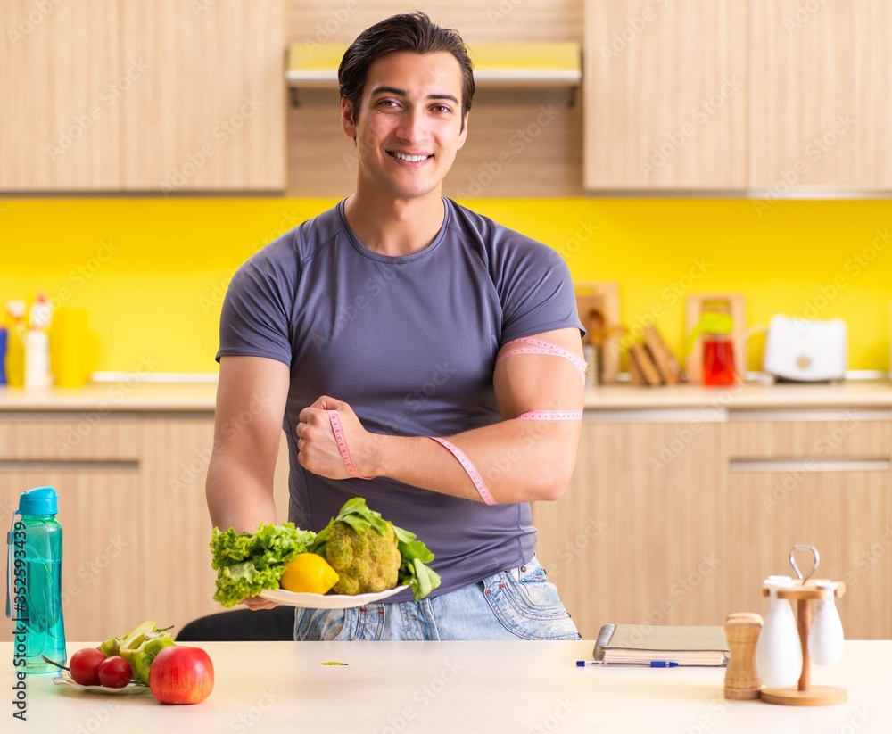 Young man in dieting and healthy eating concept Young man in dieting and healthy eating concept