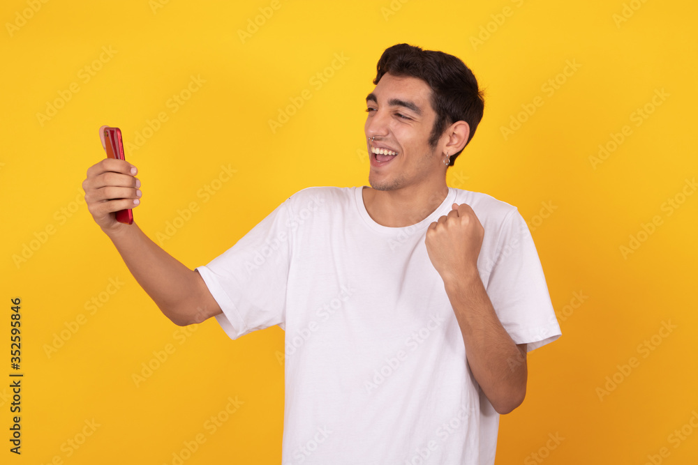 young male teenager isolated on color background young male teenager isolated on color background