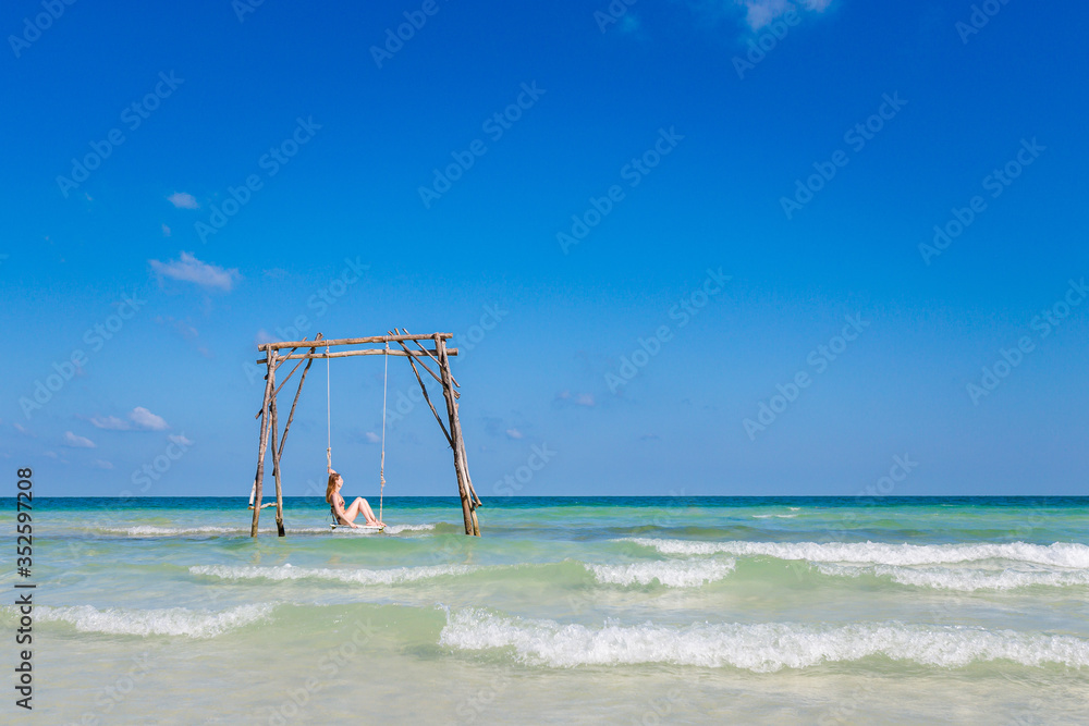 Young woman on swing Phu Quoc Young woman on swing Phu Quoc